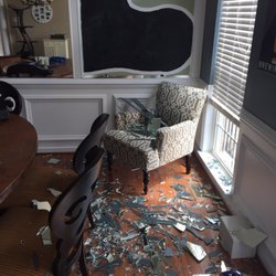 Complete Interior Package - Improperly installed mirror that fell. This is our family game table, my cat sleeps in this chair and I work from this table.