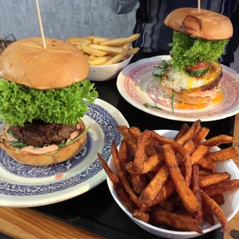 Burgerwerk - Classic Burger and sweet potato fries; and Classic Burger with Egg and fries - Burgers Near Me - Bonn, NW Burgerwerk - Classic Burger and sweet potato fries; and Classic Burger with Egg and fries - Burgers Near Me - Bonn, NW