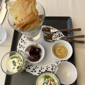 Restaurant Sonnenhof - Miniature asparagus soups as an "amuse bouche" - Hotels & Travel Near Me - Saanen, BE