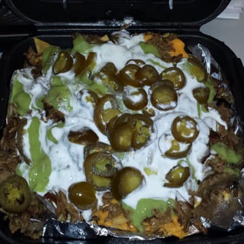Tam's Burgers - Here's a pic of their "super nachos"! A little pricey but well worth it and enough to feed 2 people. - Burgers Near Me - Paramount, California Tam's Burgers - Here's a pic of their "super nachos"! A little pricey but well worth it and enough to feed 2 people. - Burgers Near Me - Paramount, California