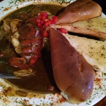 Spondivits - Filé Gumbo with some bread on the right. - Seafood Near Me - East Point, Georgia Spondivits - Filé Gumbo with some bread on the right. - Seafood Near Me - East Point, Georgia