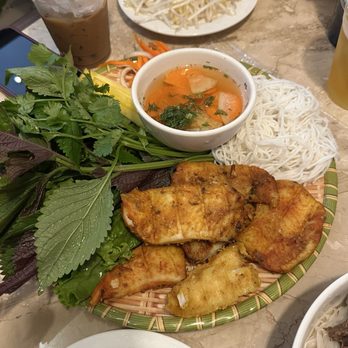 Ngon - Grilled Fish platter. This is shareable and comes with rice paper.  Dipping fish sauce is good. - Vietnamese Near Me - Garden Grove, California