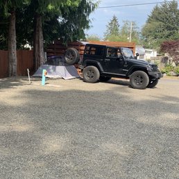 Space 5.  Tent setup on the gravel.  Have a tarp and carpet. Worked great and no issues.