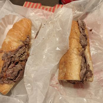 Elite Week: Portillo's Katy - Beef N Cheddar Croissant on the left and Italian Beef & Sausage on the right - Yelp Events Near Me - Katy, Texas Elite Week: Portillo's Katy - Beef N Cheddar Croissant on the left and Italian Beef & Sausage on the right - Yelp Events Near Me - Katy, Texas