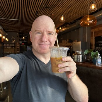 Panther Coffee - Sitting at the front window with my iced coffee. - Coffee & Tea Near Me - Miami, Florida Panther Coffee - Sitting at the front window with my iced coffee. - Coffee & Tea Near Me - Miami, Florida