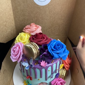 Sweet Cakes By Tay - Requested an "encanto" inspired cake. Butterflies from the movie and color scheme matched cake topper perfectly! - Custom Cakes Near Me