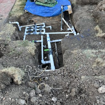 Ruiz Landscaping - a pipe laying in the ground - Landscaping Near Me