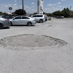 The Great Waxahachie Pothole - Pothole. still here. extravagant.