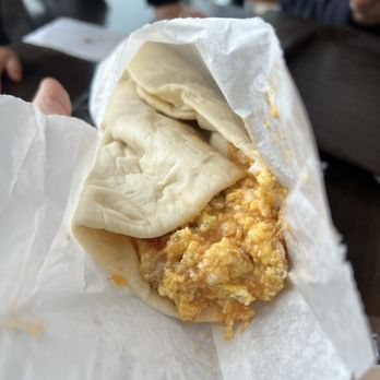 Wriggles - Sausage, Eggs and Cheese Wrap with salsa - Delis Near Me - Murray, Utah Wriggles - Sausage, Eggs and Cheese Wrap with salsa - Delis Near Me - Murray, Utah