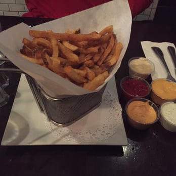 Press 195 - Bayside - Hand cut Belgian fries with five of their sauces. 1. Pineapple  2. BBQ 3. Sweet onion  4. Ketchup  5. Spicy ketchup siriracha - Sandwiches Near Me - Bayside, New York