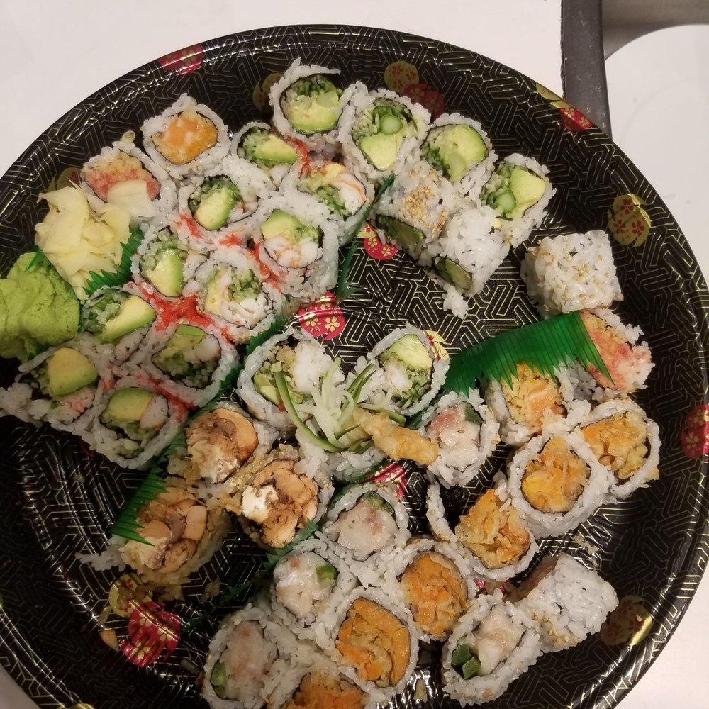 Rotten salmon and butterfish in the maki party tray. This is going in the garbage along with what was already dished onto our plates. Rotten salmon and butterfish in the maki party tray. This is going in the garbage along with what was already dished onto our plates.