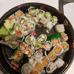 Rotten salmon and butterfish in the maki party tray. This is going in the garbage along with what was already dished onto our plates.