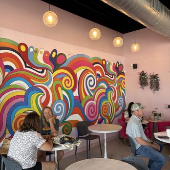Neon Belly Coffee & Bakery - Love this funky wall! - Coffee & Tea Near Me - Austin, Texas