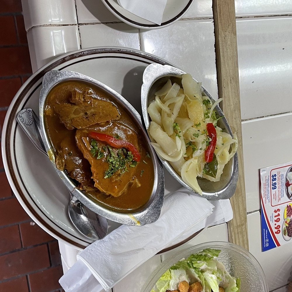 Caribe Cafe Restaurant - Boliche Asado - OMG so good!! The meat is soft, the sauce is flavorful and nice garlic on yucca! - Latin American Near Me - Miami, Florida