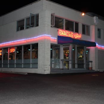 Garcia's Pizza In A Pan - A night time picture of Garcia's Pizza in a Pan from the side that faces County Market Discount Food. - Pizza Near Me - Champaign, Illinois Garcia's Pizza In A Pan - A night time picture of Garcia's Pizza in a Pan from the side that faces County Market Discount Food. - Pizza Near Me - Champaign, Illinois