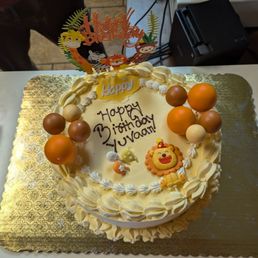 pineapple cake with mango icing.