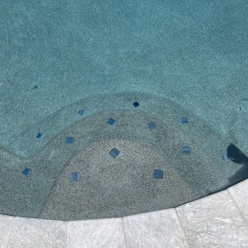 Everclean Pool & Spa - Steps are not symmetrical and pool tiles are sharp on the edges bec Gabriel forgot to place them before the pebble - Pool Cleaners Near Me - Pomona, California