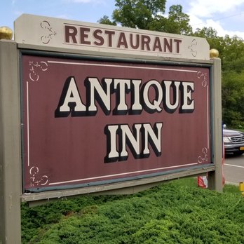 Antique Inn - the sign for the restaurant - American Near Me - Penn Yan, New York Antique Inn - the sign for the restaurant - American Near Me - Penn Yan, New York