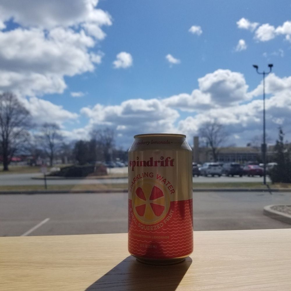 Be Nourished - a can of soda on a table - Salad Near Me - Schenectady, New York Be Nourished - a can of soda on a table - Salad Near Me - Schenectady, New York