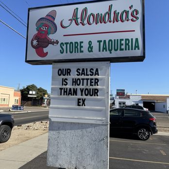 Alondras Restaurant - Alondra's Store and Taqueria sign that says "Our salsa is hotter than your ex" - Mexican Near Me - Nampa, Idaho