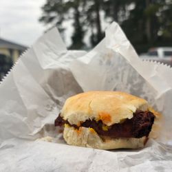 Byrd's Restaurant - Link Sausage biscuit with mustard and hot sauce