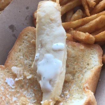 Holdaak Fried Chicken - Chicken strip without the breading reveals an over-cooked and dried out chicken tender.  A - Chicken Shop Near Me - Fullerton, California