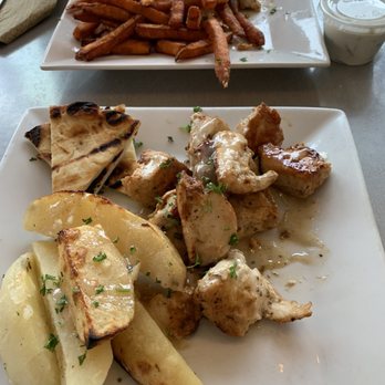 Nick’s Bistro - Both meals are Chicken Souvlaki Platter's one is with sweet potato fries and mine has the lemon potatoes! - Greek Near Me - Forest Hills, New York Nick’s Bistro - Both meals are Chicken Souvlaki Platter's one is with sweet potato fries and mine has the lemon potatoes! - Greek Near Me - Forest Hills, New York
