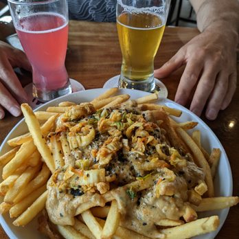 Ola Brew - Hilo - Kimchi fries with 1/2 pint pours of dragon fruit cider and Mo Hazy IPA - Brewpubs Near Me - Hilo, Hawaii Ola Brew - Hilo - Kimchi fries with 1/2 pint pours of dragon fruit cider and Mo Hazy IPA - Brewpubs Near Me - Hilo, Hawaii
