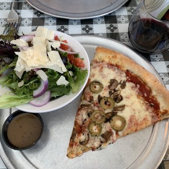The Pie-Zan's Pizzeria - Slice of mushroom and green olive with a side salad - Italian Near Me - Gunnison, Colorado The Pie-Zan's Pizzeria - Slice of mushroom and green olive with a side salad - Italian Near Me - Gunnison, Colorado