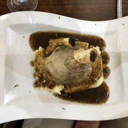 Olive & Thyme - Lamb Knuckle over a bed of mashed potatoes
