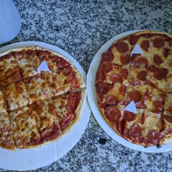 Danny O's Bar & Grill - Cheese pizza on left, pepperoni pizza on right - Pubs Near Me - Chesterton, Indiana