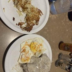 Maggies Restaurant - Biscuits and pork sausage with grave, hash browns and eggs over easy, yumm!