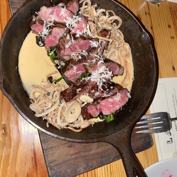 The Lark - 16 oz ribeye with broccolini and fried shallots - New American Near Me - Santa Barbara, California The Lark - 16 oz ribeye with broccolini and fried shallots - New American Near Me - Santa Barbara, California
