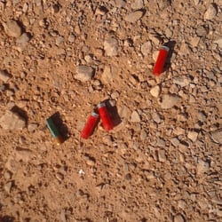 Gilmore Cliff Shadows Trailhead - Shells from a 12 gauge Shotgun. This is NW Vegas, and the local rednecks come out here to shoot their guns.