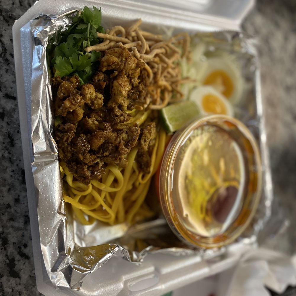 Nine House - a take out container of food - Burmese Near Me - Fort Wayne, Indiana Nine House - a take out container of food - Burmese Near Me - Fort Wayne, Indiana