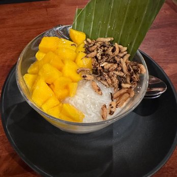 Taurus Ox - Mango coconut sticky rice - Laotian Near Me - Seattle, Washington Taurus Ox - Mango coconut sticky rice - Laotian Near Me - Seattle, Washington