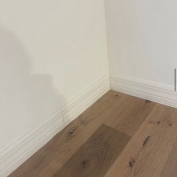 Flooring America - Bad caulk job on baseboards; damaged baseboards - Flooring Near Me - Orlando, Florida Flooring America - Bad caulk job on baseboards; damaged baseboards - Flooring Near Me - Orlando, Florida
