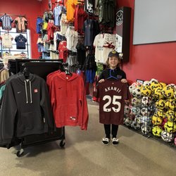WeGotSoccer - Me after receiving a Manchester city jersey