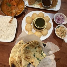 Pani Puri, Garlic Naan, Chicken Tikka Masala, and Aloo Samosa