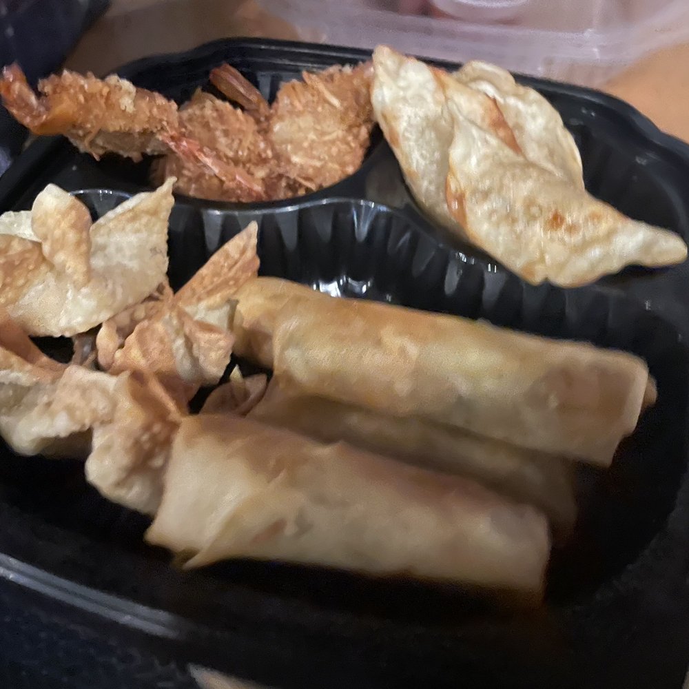 Talay Thai - Appetizer sampler with egg rolls, dumplings, won tons and coconut shrimp hit the spot - Thai Near Me - Steamboat Springs, Colorado Talay Thai - Appetizer sampler with egg rolls, dumplings, won tons and coconut shrimp hit the spot - Thai Near Me - Steamboat Springs, Colorado
