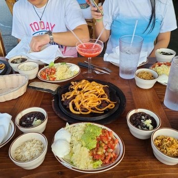 Jose Tejas - Full table of fajitas in outdoor dining - Tex-Mex Near Me - Fairfield, New Jersey Jose Tejas - Full table of fajitas in outdoor dining - Tex-Mex Near Me - Fairfield, New Jersey