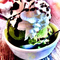 Oka Sushi - There green tea ice cream I edited the photo to show creativity behind the restaurant that it's an art form