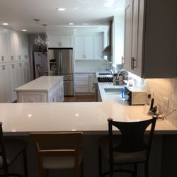 A1 Quality Contractor - Kitchen remodel - cabinetry, countertops, sink, hardware, install oven and overhead range.