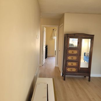 Latta Floors - an empty room with a dresser - Flooring Near Me - Livermore, California Latta Floors - an empty room with a dresser - Flooring Near Me - Livermore, California