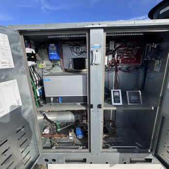Frost Zone Refrigeration - Inside view of a rooftop unit during troubleshooting checking boards, wiring, and refrigeration components to ensure proper operation. - Heating & Air Conditioning/HVAC Near Me - North Miami Beach, Florida Frost Zone Refrigeration - Inside view of a rooftop unit during troubleshooting checking boards, wiring, and refrigeration components to ensure proper operation. - Heating & Air Conditioning/HVAC Near Me - North Miami Beach, Florida