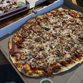 Football Pizza - Pepperoni and green olive pizza - Pizza Near Me - Minneapolis, Minnesota Football Pizza - Pepperoni and green olive pizza - Pizza Near Me - Minneapolis, Minnesota