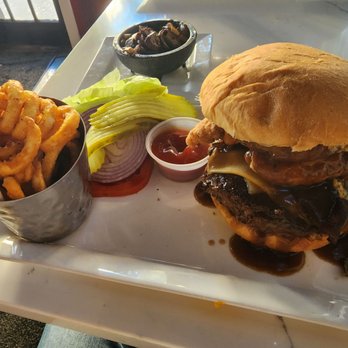 Engine No 9 - Brisket/hamburger mix, bacon, fried chicken, potato cake, cheese, gravy. I asked for the extra toppings lettuce,  onion, tomatoe. - Burgers Near Me - Saint Petersburg, Florida