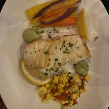 Rockefeller's - Sea Bass with Mango salsa and veggies - Steakhouses Near Me - Oak Lawn, Illinois Rockefeller's - Sea Bass with Mango salsa and veggies - Steakhouses Near Me - Oak Lawn, Illinois