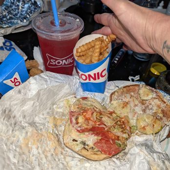 Sonic Drive-In - This is how I received my meal . My burger looked like some puked on it . Never seen anything like it .Total disappointment. - Burgers Near Me - Smithfield, Rhode Island