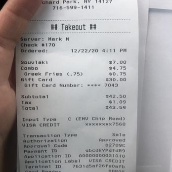 Pita Gourmet - a person holding a receipt - Mediterranean Near Me - Orchard Park, New York